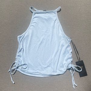 High neck crop top with ties in baby blue